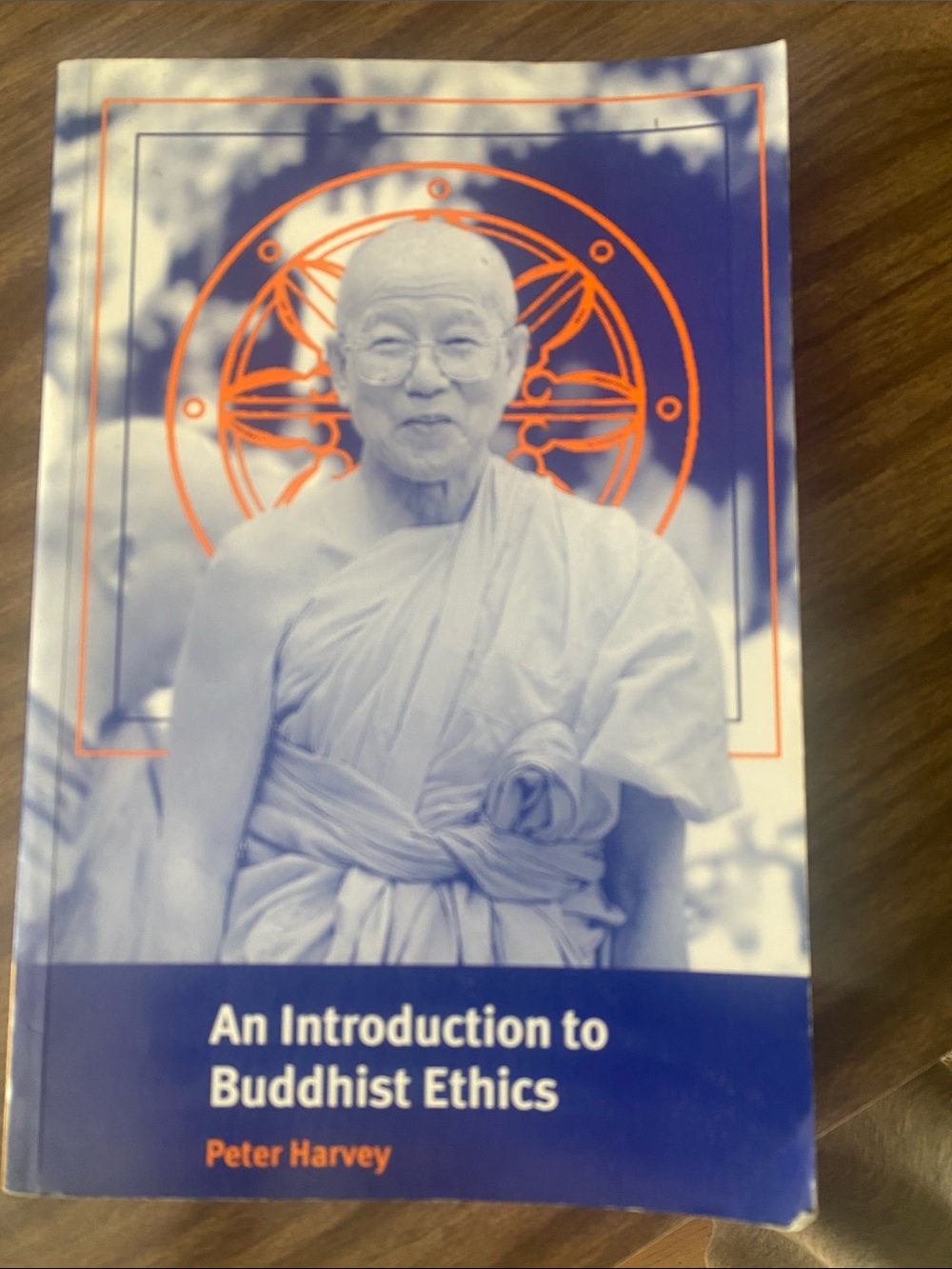 An Introduction to Buddhist Ethics by Peter Harvey - Blue & Orange Cover
